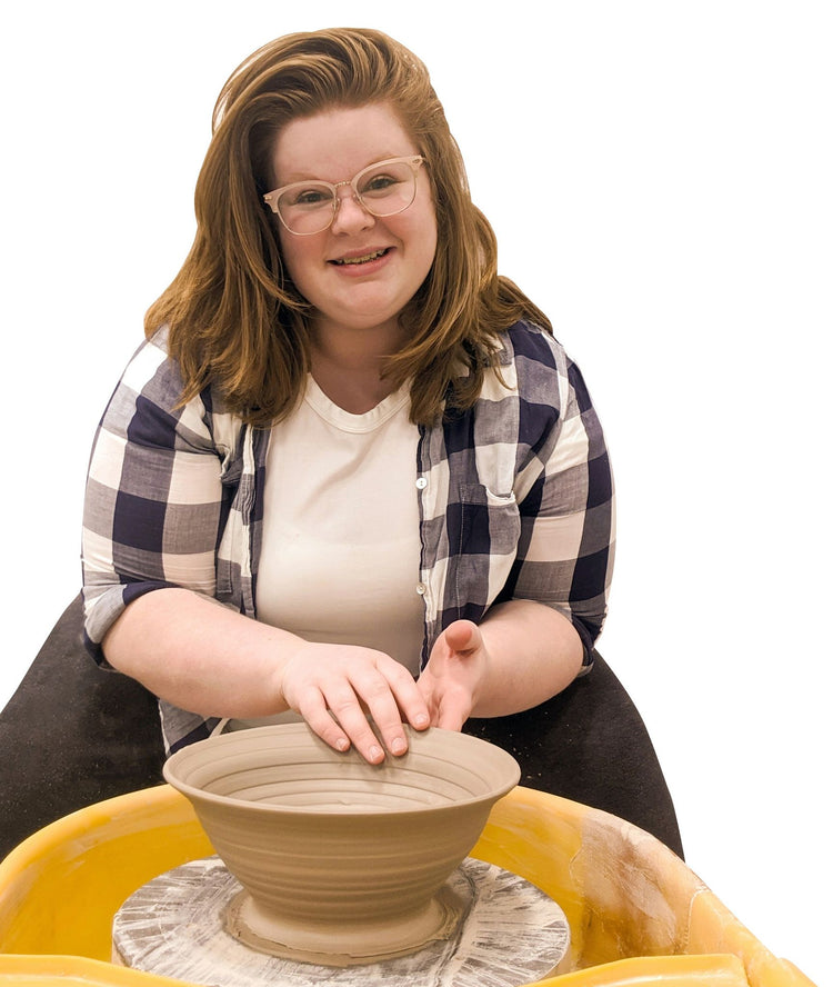 Alicia throwing a bowl on her pottery wheel